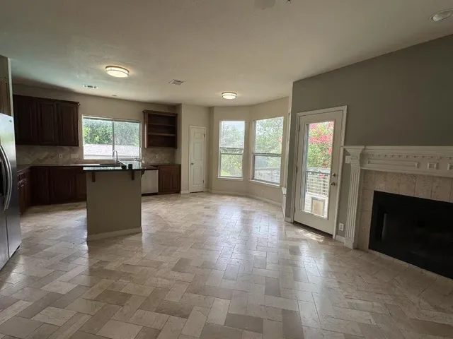 a view of a kitchen with a sink