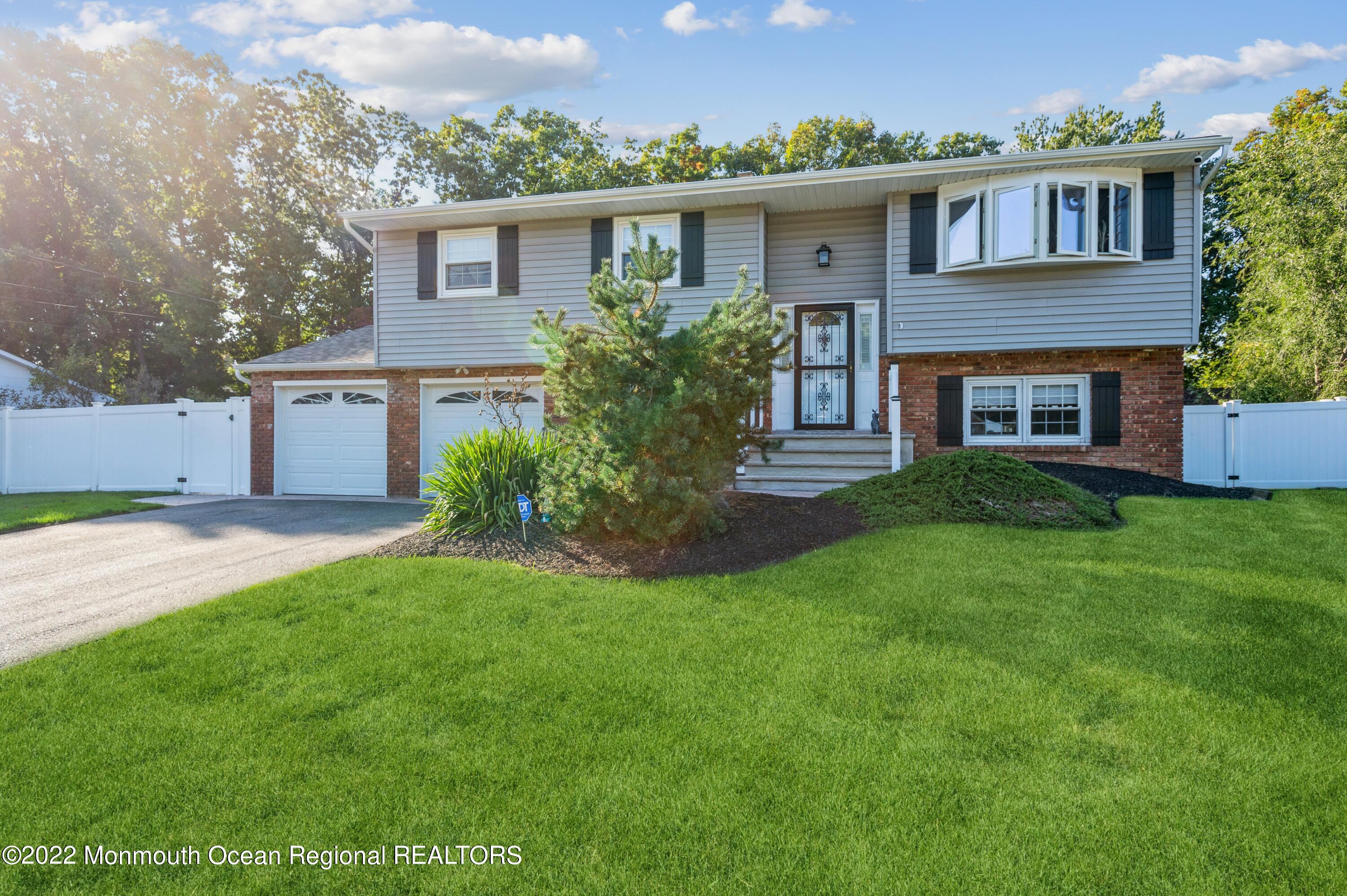 103 Newbury Road Howell, NJ 07731 - Photo 1 of 22 01_103NewburyRd_57_FrontView_HiRes