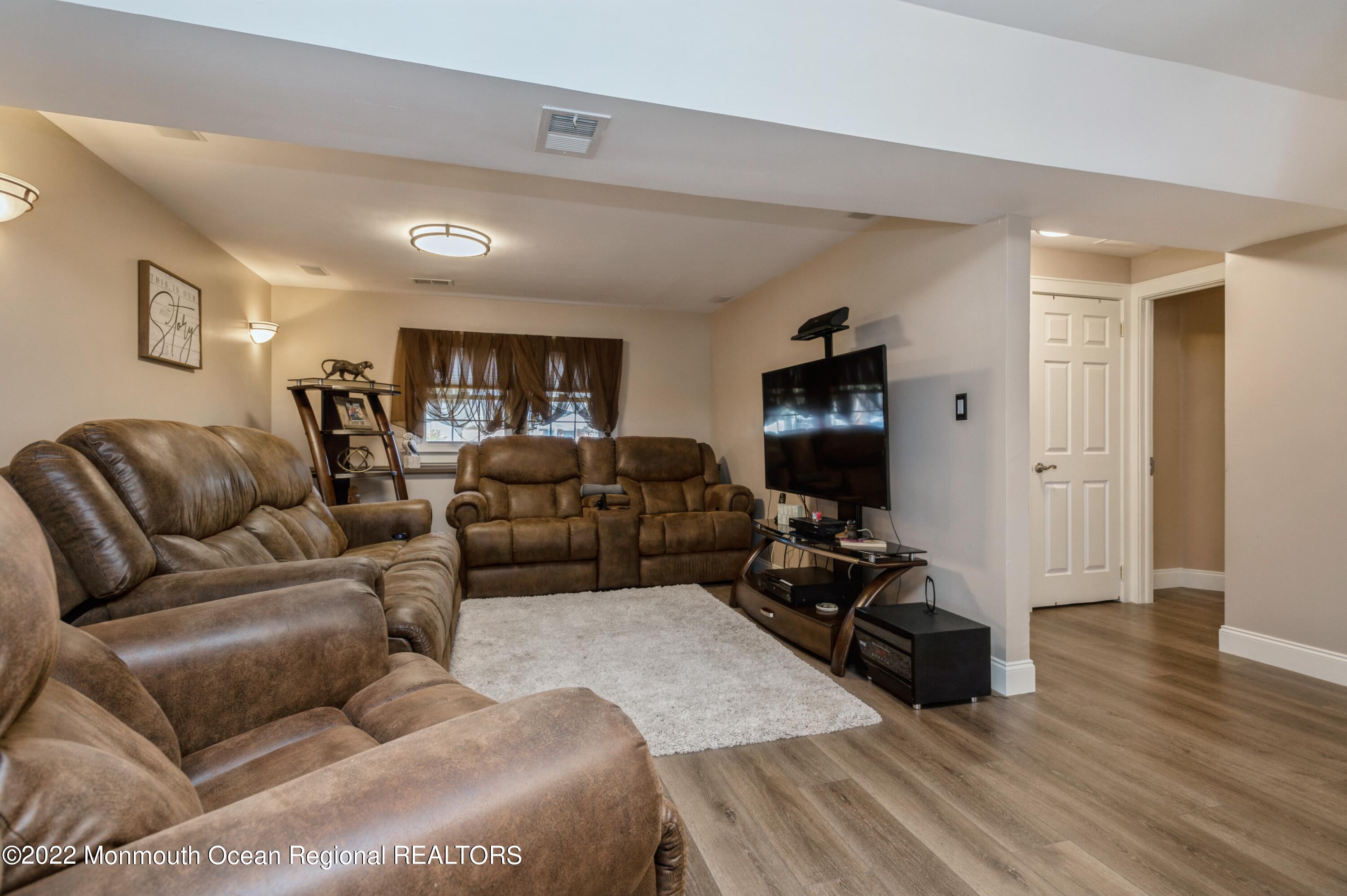 103 Newbury Road Howell, NJ 07731 - Photo 12 of 22 08_103NewburyRd_3_FamilyRoom_HiRes