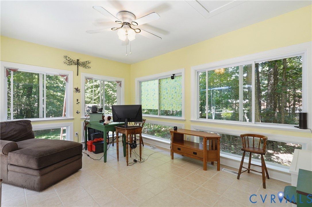 12512 2nd Branch Road Chesterfield, VA 23838 - Photo 23 of 56 a living room with furniture and a large window