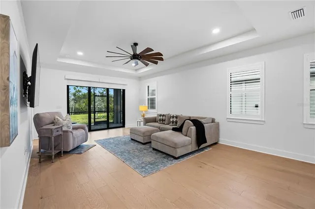 a view of a kitchen with furniture and a window