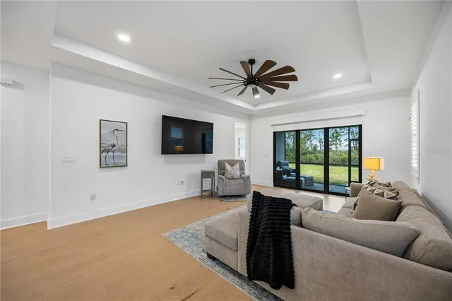 a kitchen with stainless steel appliances kitchen island granite countertop a sink and cabinets