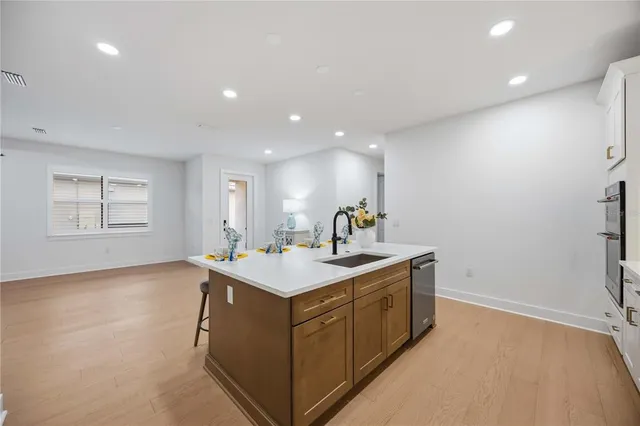 a bedroom with bed chair and window