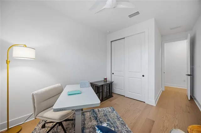 an aerial view of a house with a garden