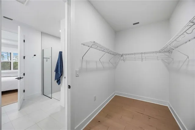 an aerial view of a house with a ocean view