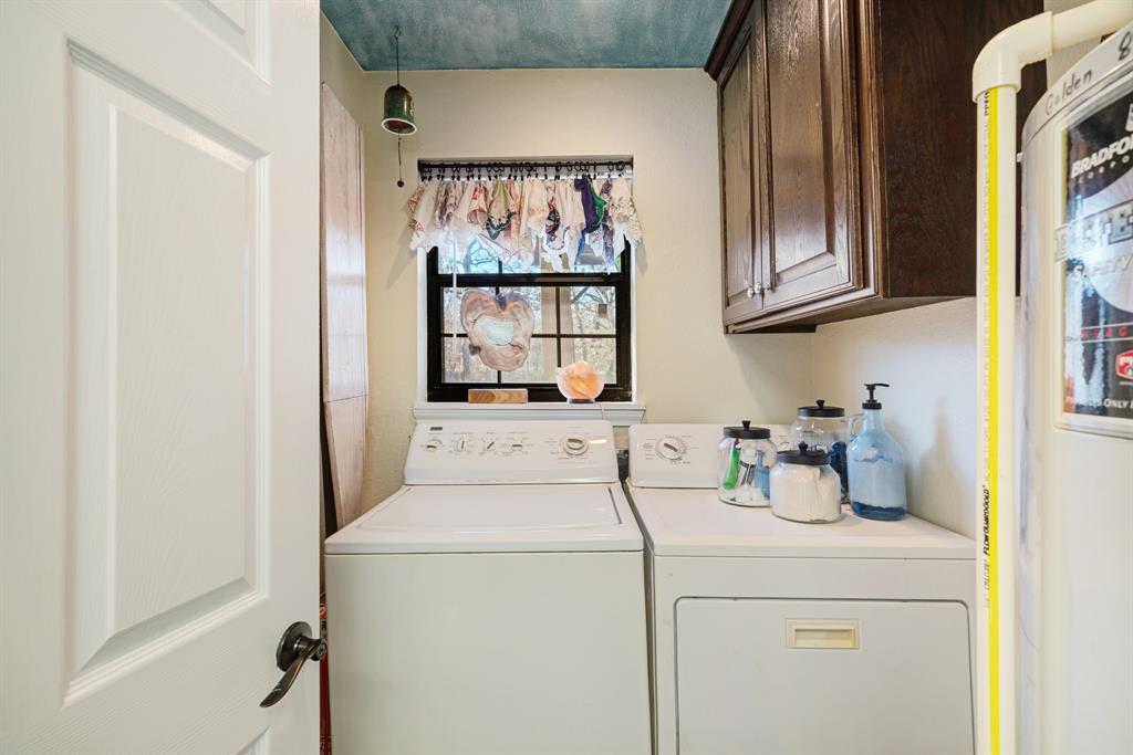 1431 County Road Paris, TX 75462 - Photo 18 of 27 a utility room with dryer and washer