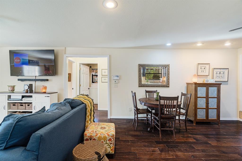 1431 County Road Paris, TX 75462 - Photo 5 of 27 a living room with furniture and a flat screen tv