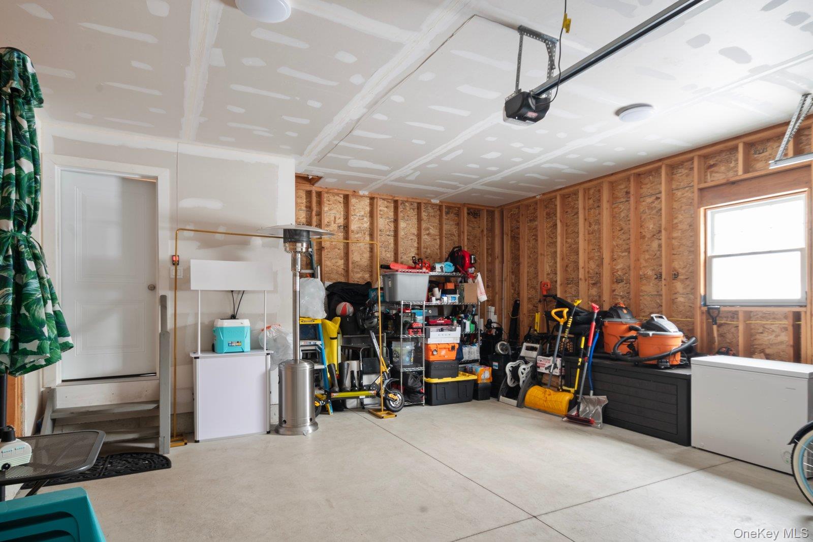 65 Doane Avenue Bellport, NY 11713 - Photo 14 of 37 a view of a room with gym equipment