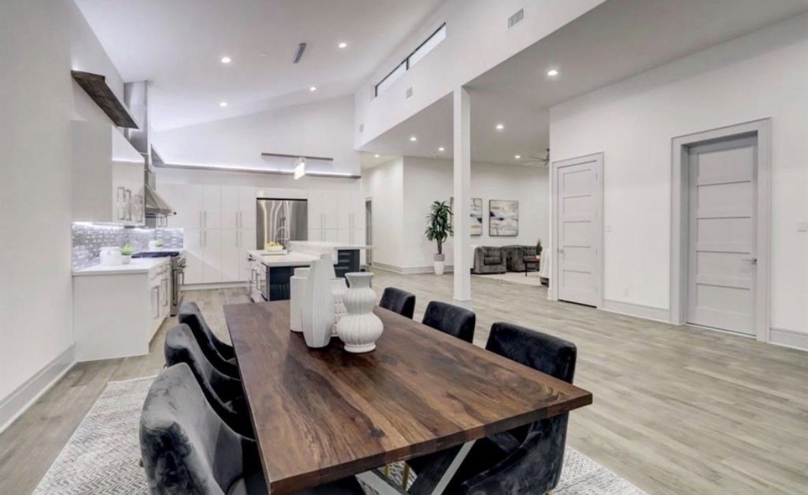 1709 Reverse Street Houston, TX 77055 - Photo 7 of 26 a view of a dining room with furniture and wooden floor