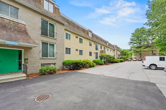 a view of a house with a garden