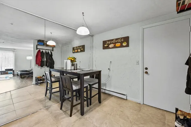 a view of a dining room with furniture
