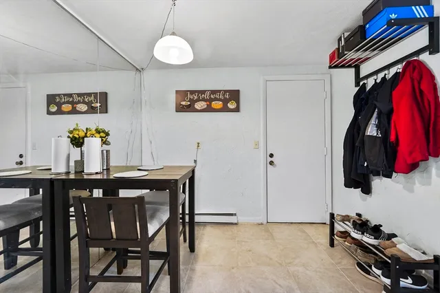 a view of a workspace with furniture