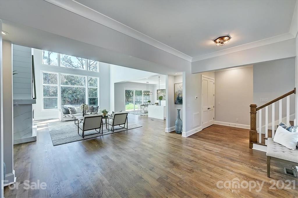 2011 Providence Road Charlotte, NC 28211 - Photo 2 of 37 a view of workspace with wooden floor and furniture