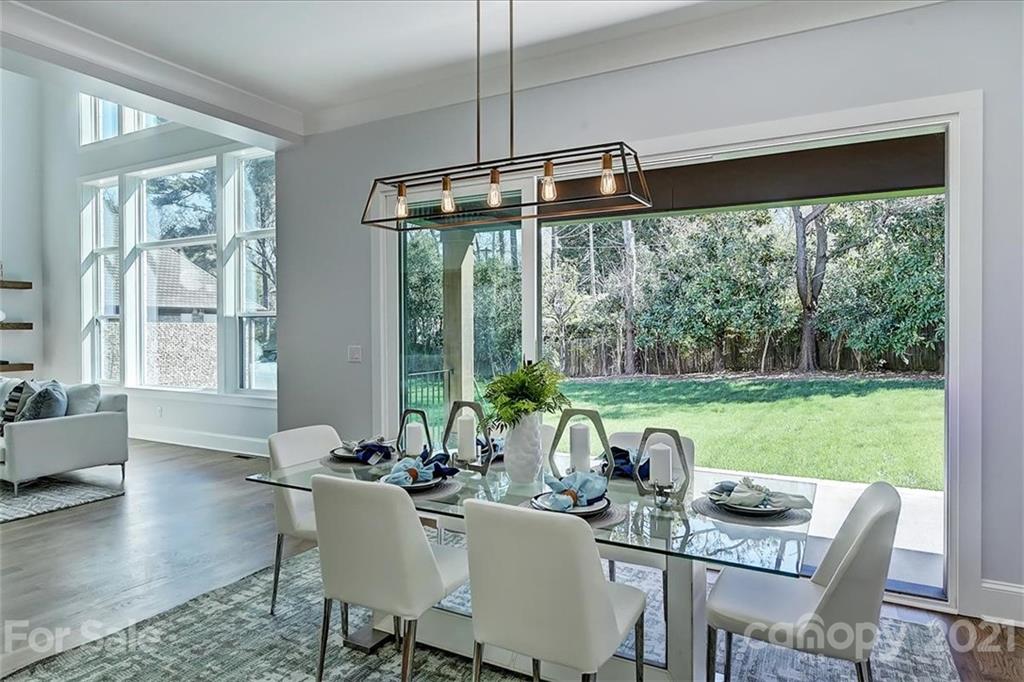 2011 Providence Road Charlotte, NC 28211 - Photo 13 of 37 a view of a dining room with furniture window and outside view