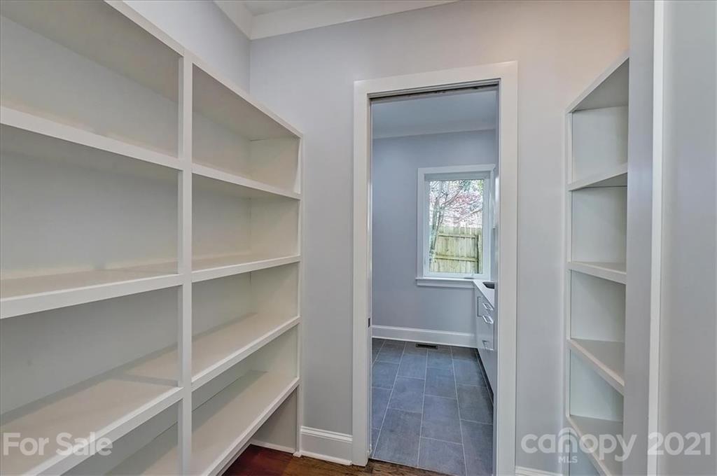 2011 Providence Road Charlotte, NC 28211 - Photo 14 of 37 a view of a hallway with closet and a window