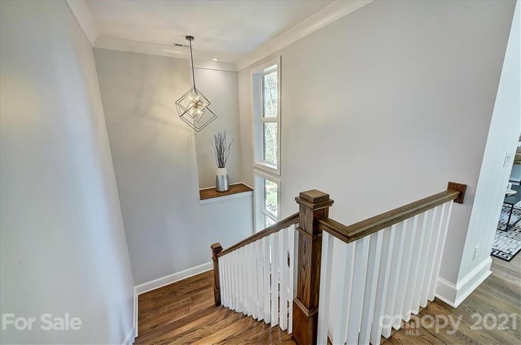 2011 Providence Road Charlotte, NC 28211 - Photo 21 of 37 a view of stairs and chandelier
