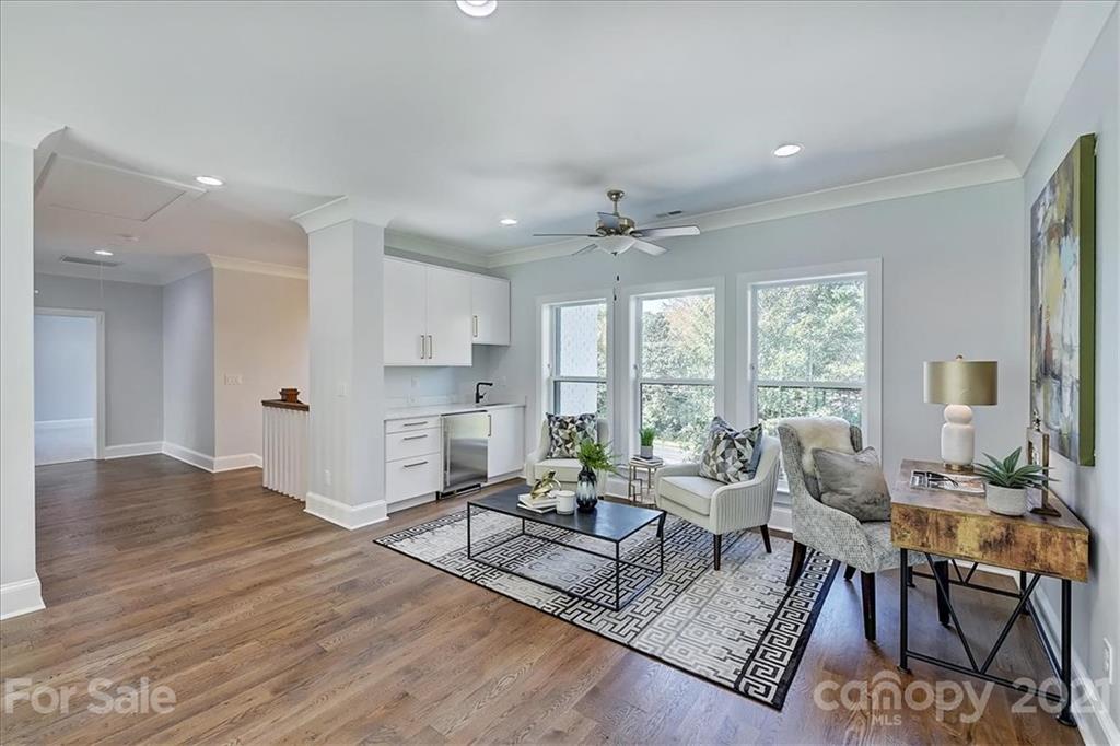 2011 Providence Road Charlotte, NC 28211 - Photo 23 of 37 a living room with furniture and a large window