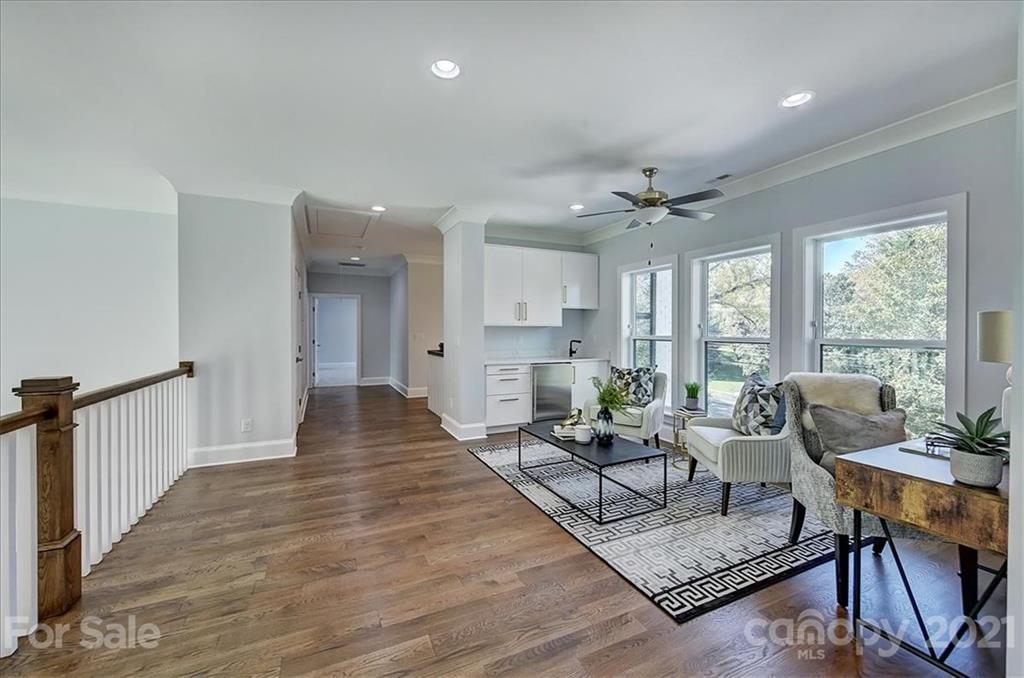 2011 Providence Road Charlotte, NC 28211 - Photo 24 of 37 a living room with furniture and a large window