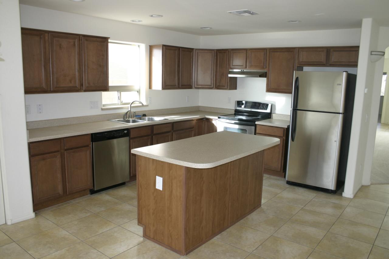 Kitchen with Island and Stainless Appl.