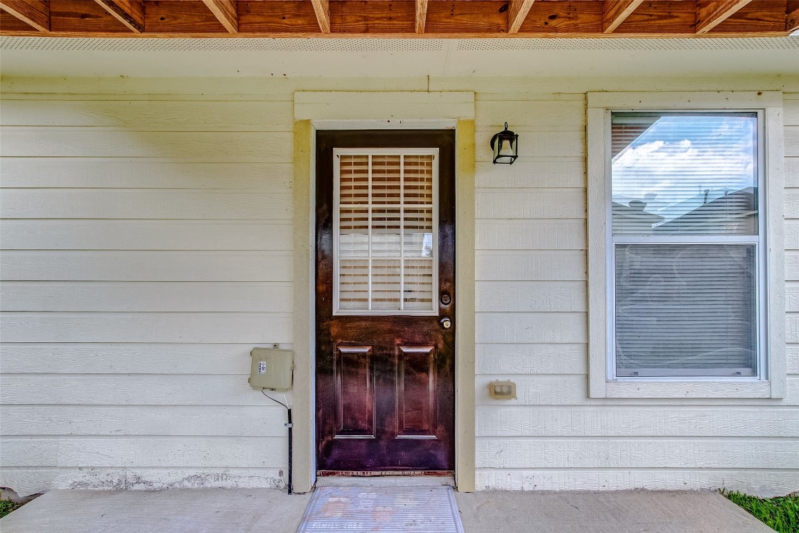 10822 Cane Grove Lane Houston, TX 77075 - Photo 39 of 44 a view of front door of house with stairs