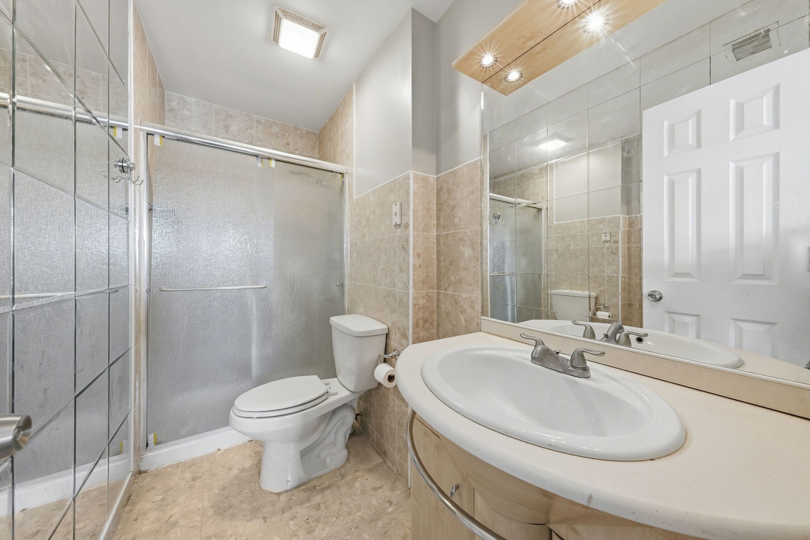447 Thorndale Court Buffalo Grove, IL 60089 - Photo 16 of 24 a bathroom with a sink toilet and shower