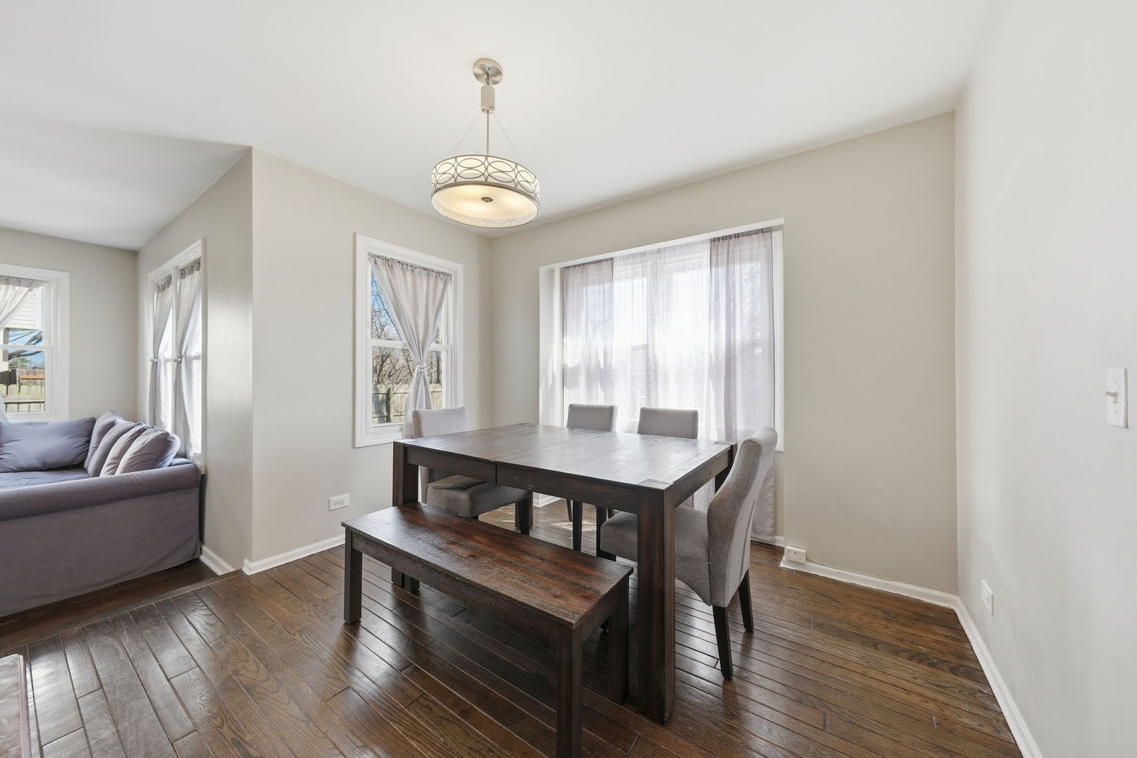 447 Thorndale Court Buffalo Grove, IL 60089 - Photo 8 of 24 a living room with furniture and wooden floor