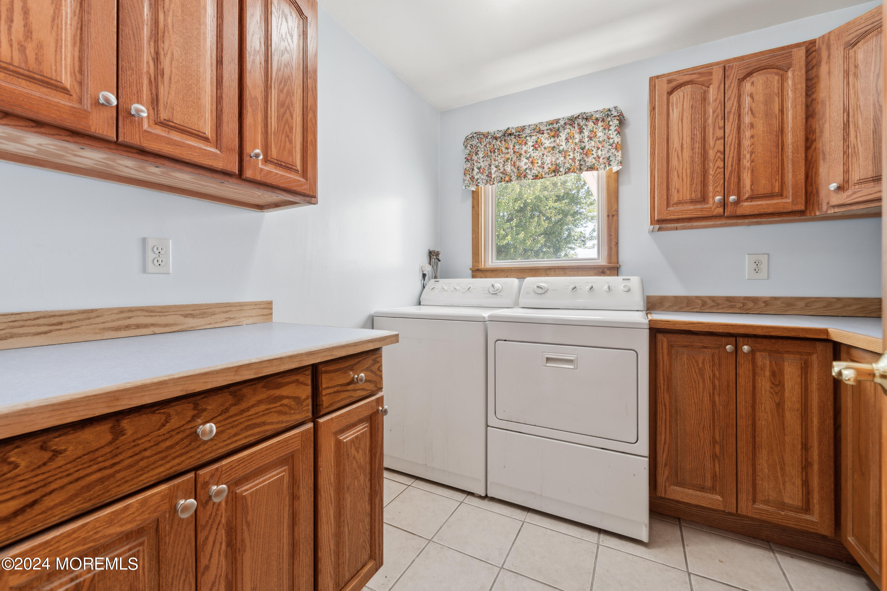 232 11th Street Barnegat, NJ 08005 - Photo 14 of 39 a kitchen with stainless steel appliances granite countertop a sink window and cabinets