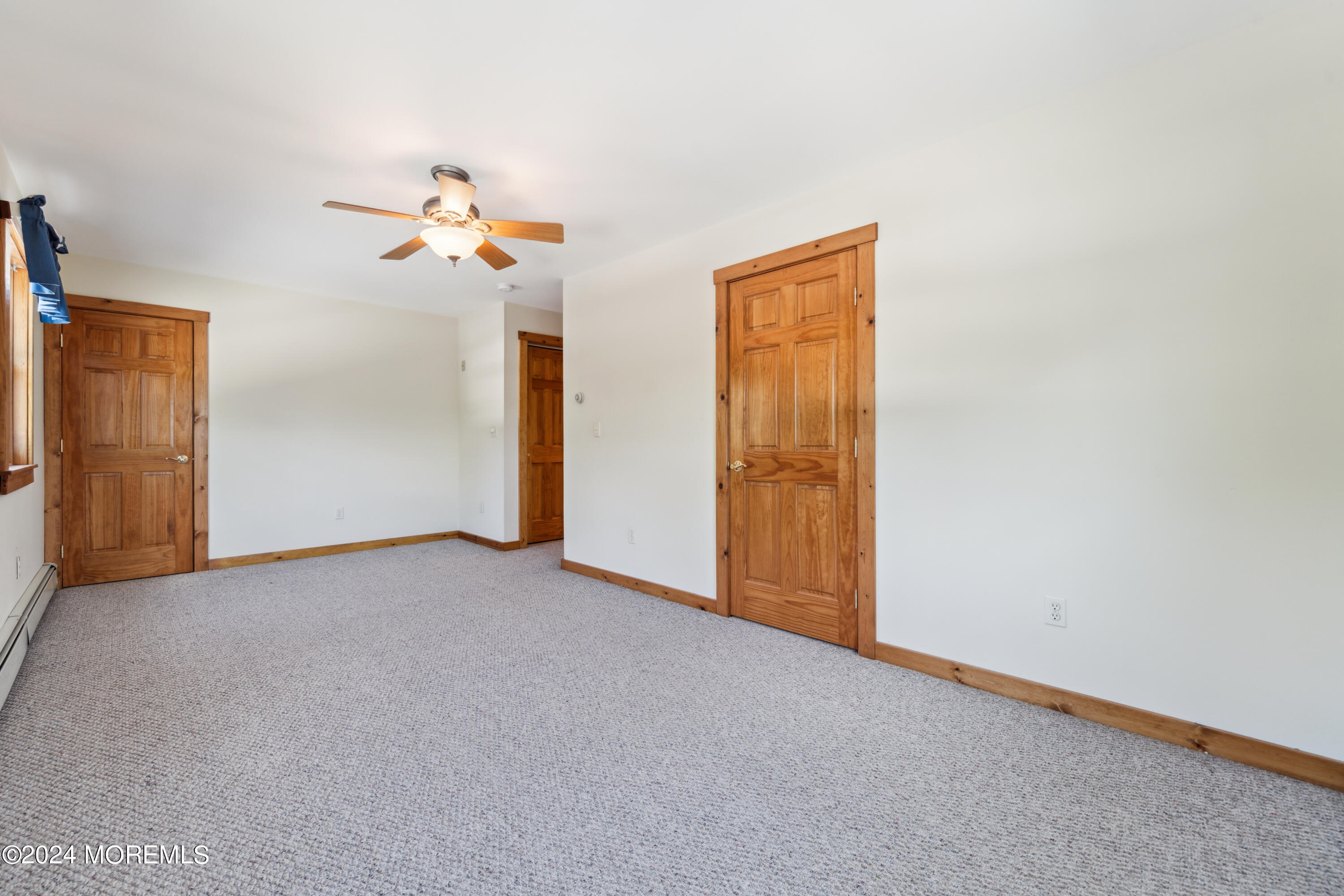 232 11th Street Barnegat, NJ 08005 - Photo 22 of 39 a view of empty room with ceiling fan