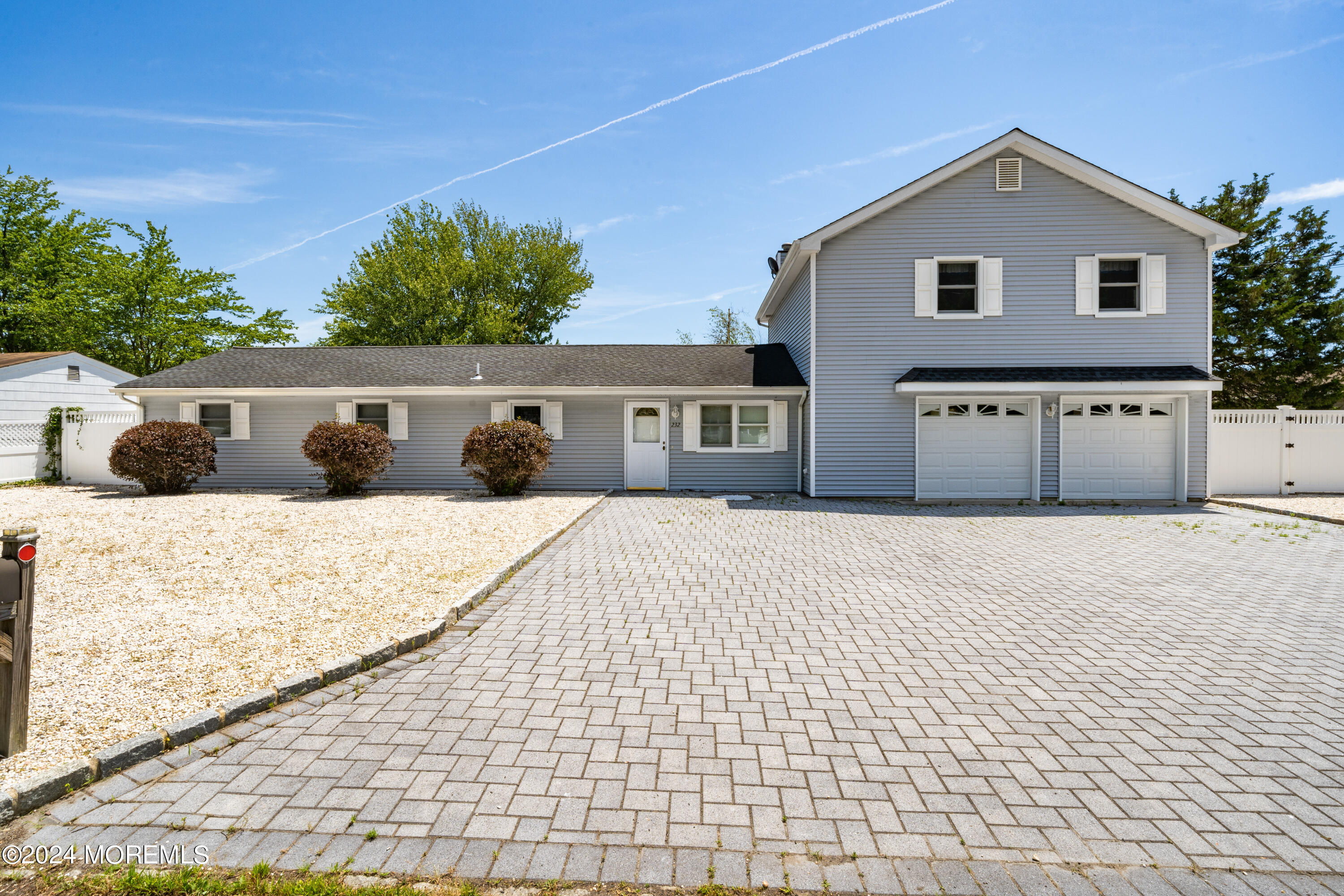 232 11th Street Barnegat, NJ 08005 - Photo 3 of 39 a front view of a house with a yard