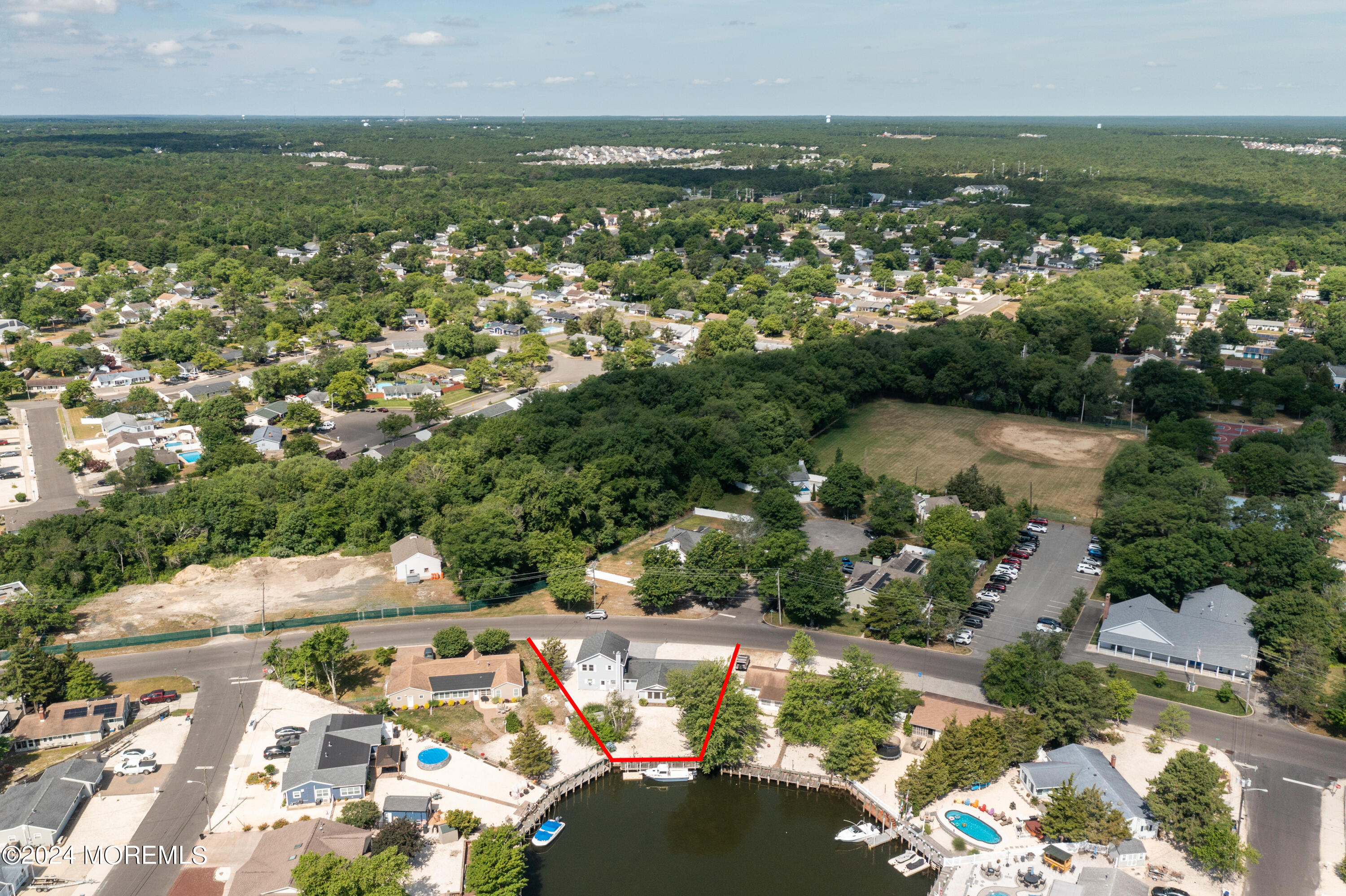 232 11th Street Barnegat, NJ 08005 - Photo 36 of 39 an aerial view of residential houses with outdoor space and trees
