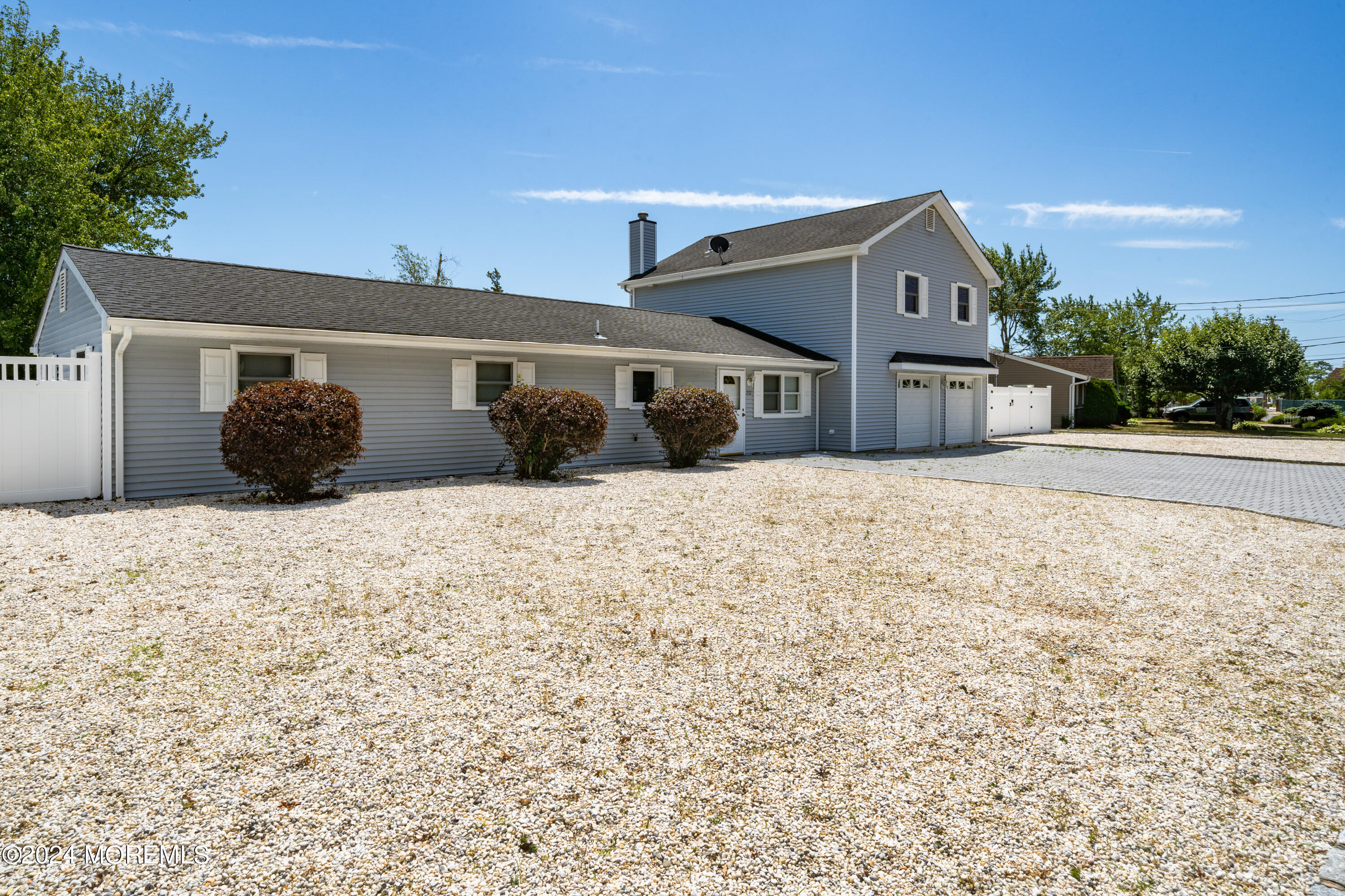 232 11th Street Barnegat, NJ 08005 - Photo 5 of 39 a view of a house with a snow in the yard