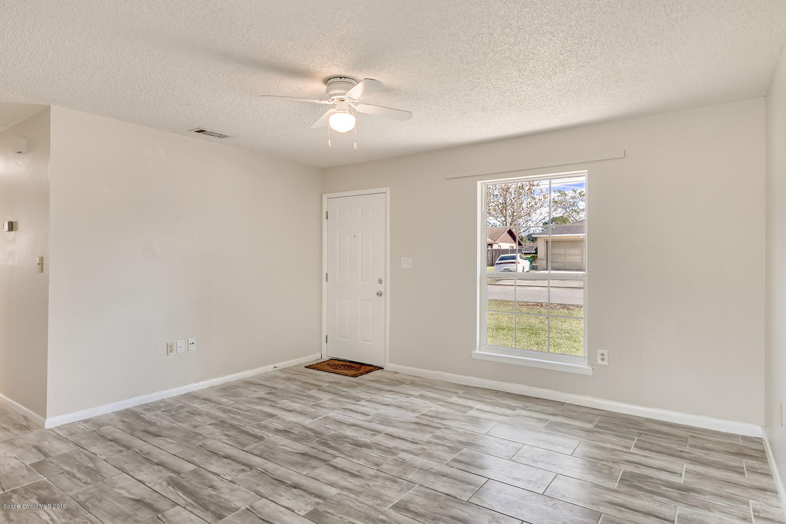 5964 Rena Avenue Cocoa, FL 32927 - Photo 2 of 16 Living Room
