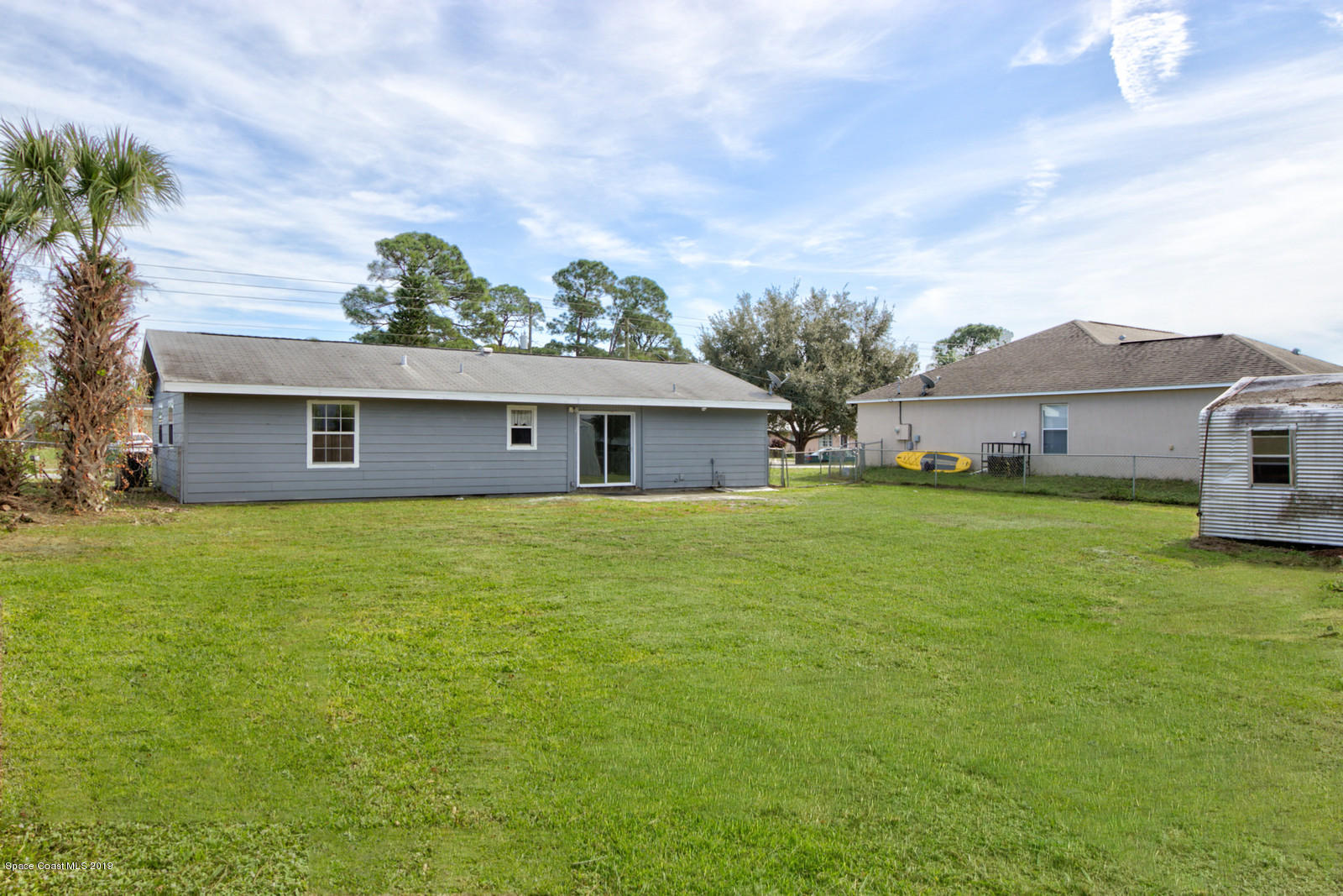 5964 Rena Avenue Cocoa, FL 32927 - Photo 14 of 16 Back of Home