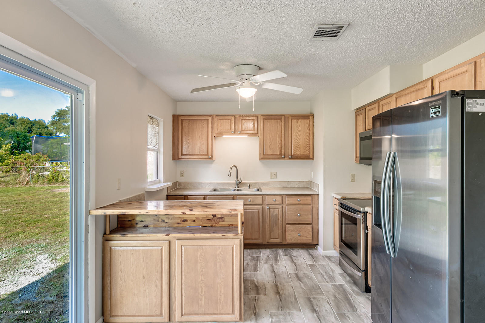 5964 Rena Avenue Cocoa, FL 32927 - Photo 6 of 16 Kitchen