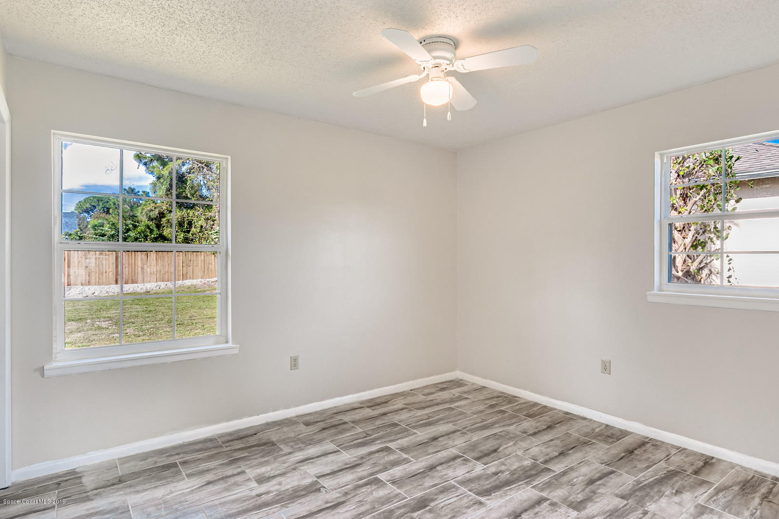5964 Rena Avenue Cocoa, FL 32927 - Photo 7 of 16 Master Bedroom