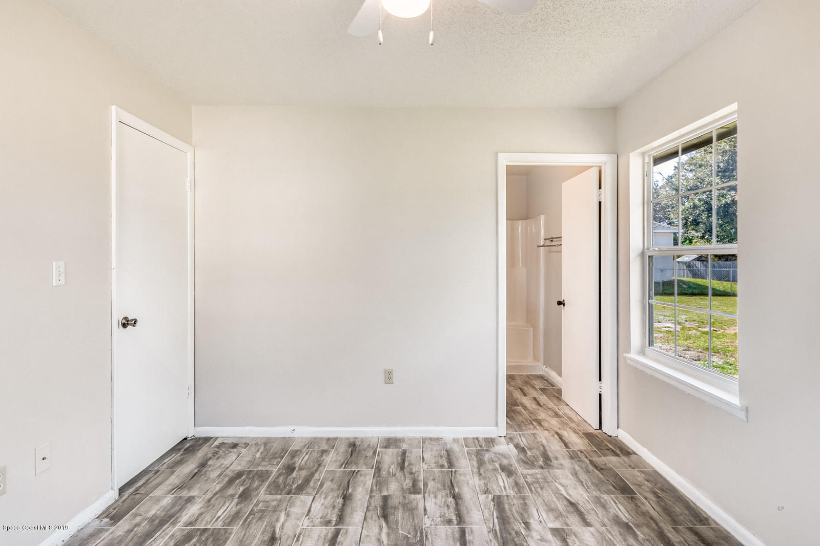 5964 Rena Avenue Cocoa, FL 32927 - Photo 8 of 16 Master Bedroom