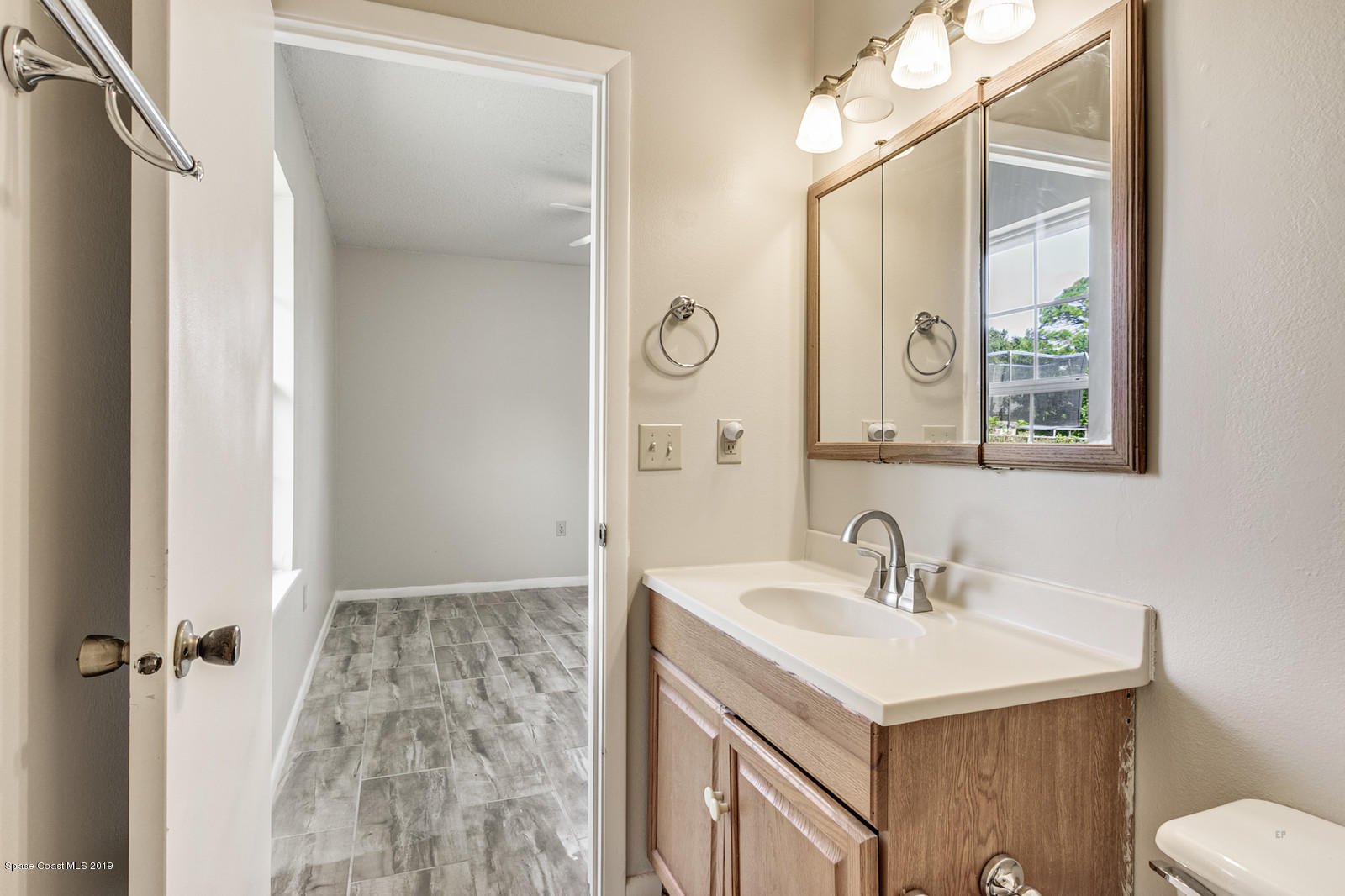 5964 Rena Avenue Cocoa, FL 32927 - Photo 9 of 16 Master Bathroom