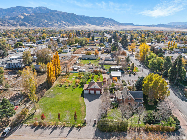390 North 100 West Monroe, UT 84754 - Photo 145 of 167 Aerial overview of property's location with a mountain backdrop and nearby suburban area