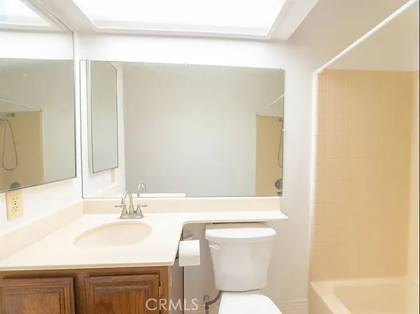 a bathroom with a sink and a toilet