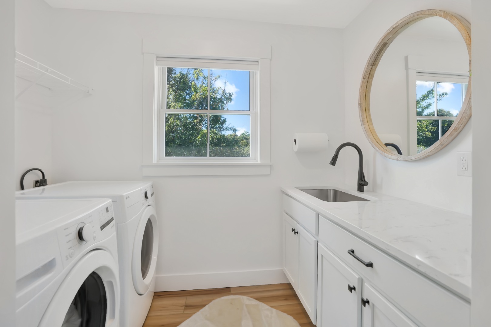 33 Lagoon Pond Road Vineyard Haven, MA 02568 - Photo 29 of 42 a bathroom with a sink and a mirror