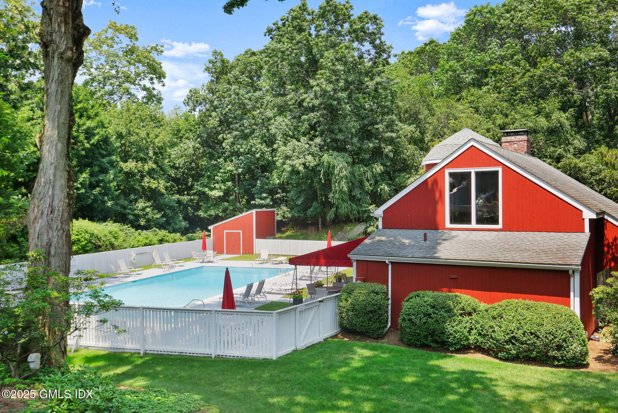 74 Silo Circle Riverside, CT 06878 - Photo 28 of 29 a front view of a house with a yard