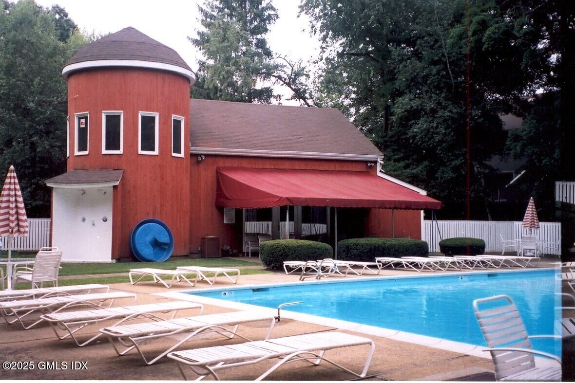 74 Silo Circle Riverside, CT 06878 - Photo 3 of 29 front view of a house with a yard