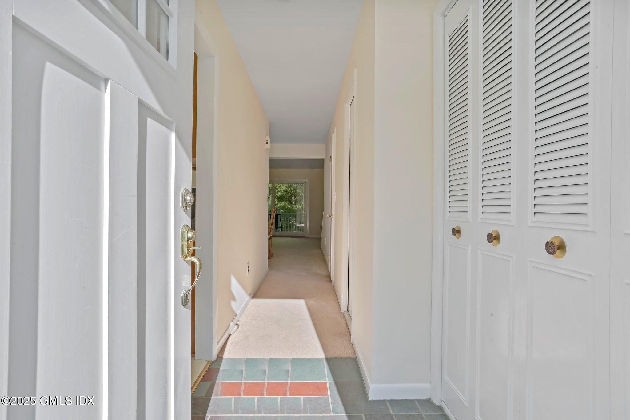 74 Silo Circle Riverside, CT 06878 - Photo 4 of 29 a view of a bedroom from a hallway