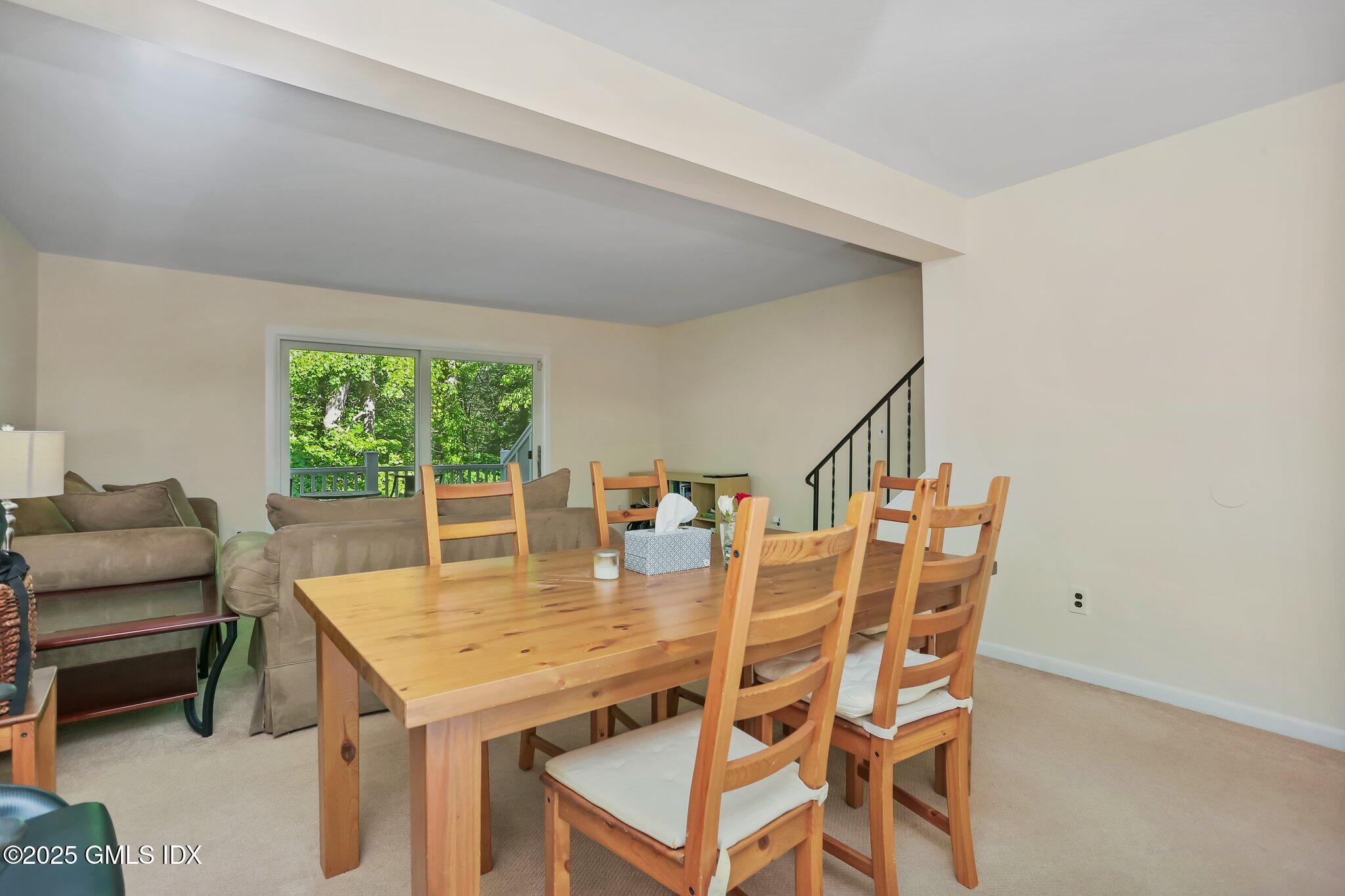 74 Silo Circle Riverside, CT 06878 - Photo 10 of 29 a view of a dining room with furniture and wooden floor