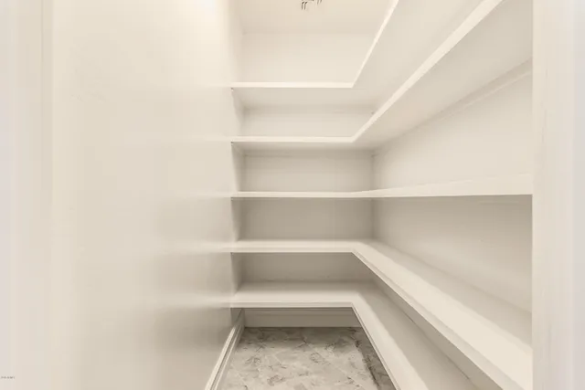 a view of a room with shelves