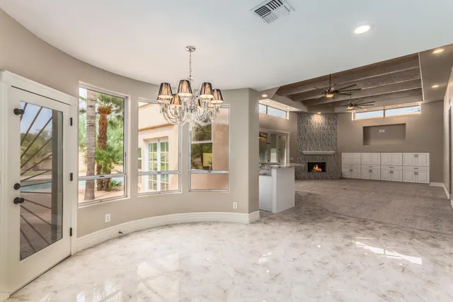 a view of a hallway with windows