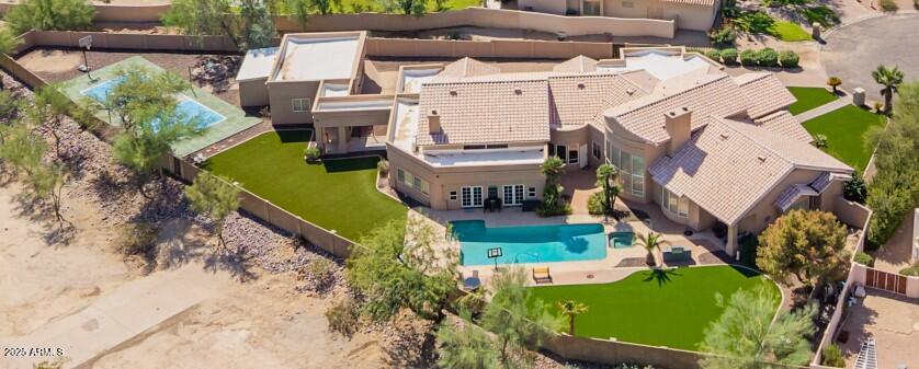 3332 East Cherokee Street Phoenix, AZ 85044 - Photo 3 of 47 an aerial view of a house with a garden and lake view