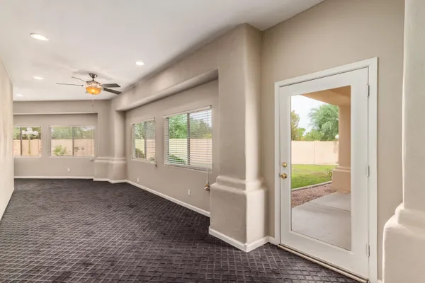 a view of an empty room and window