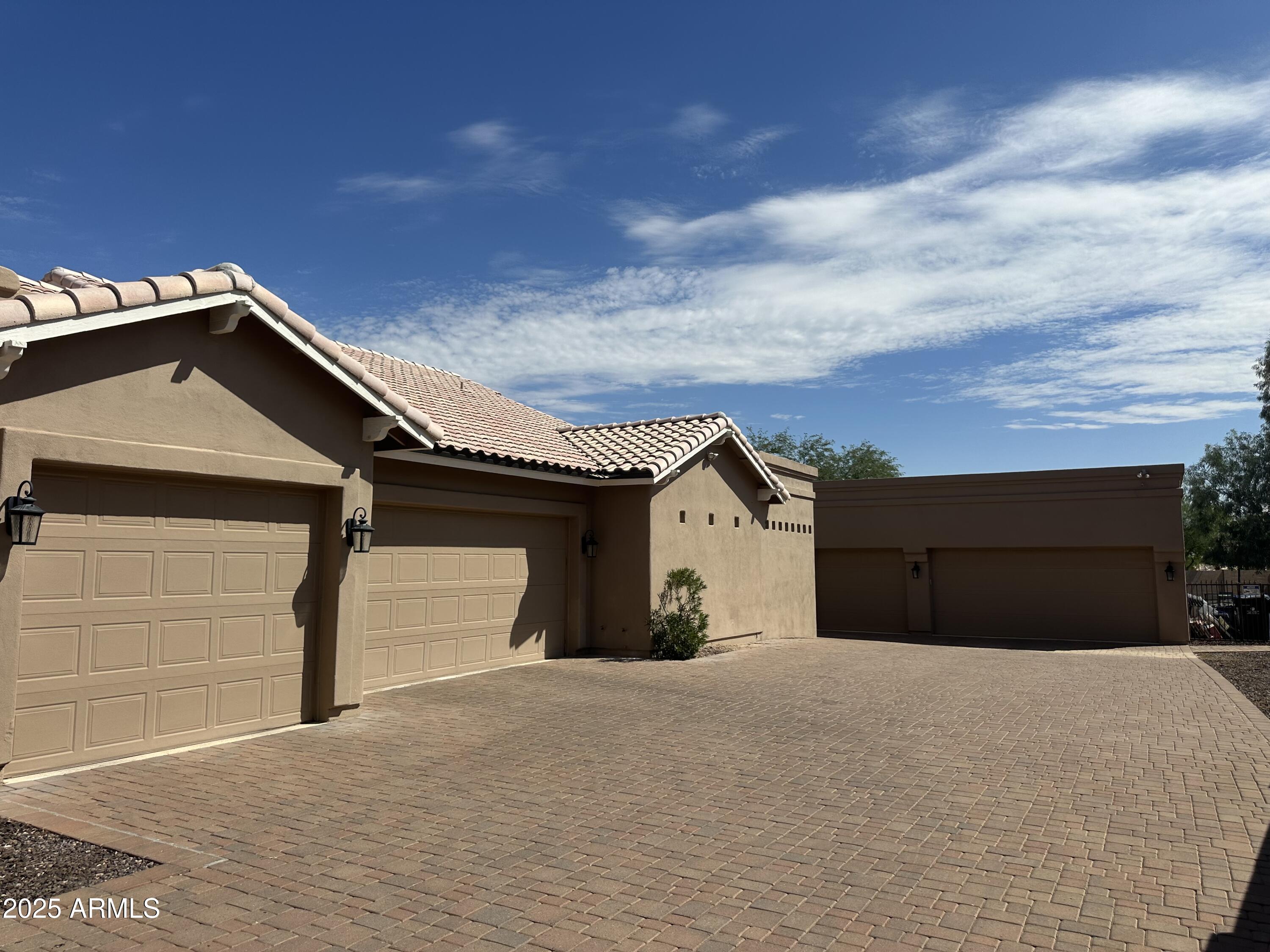 3332 East Cherokee Street Phoenix, AZ 85044 - Photo 35 of 47 a view of a house with a yard