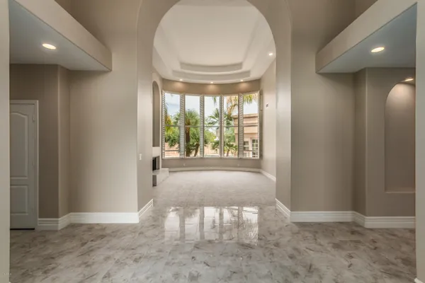 a view of livingroom and front door